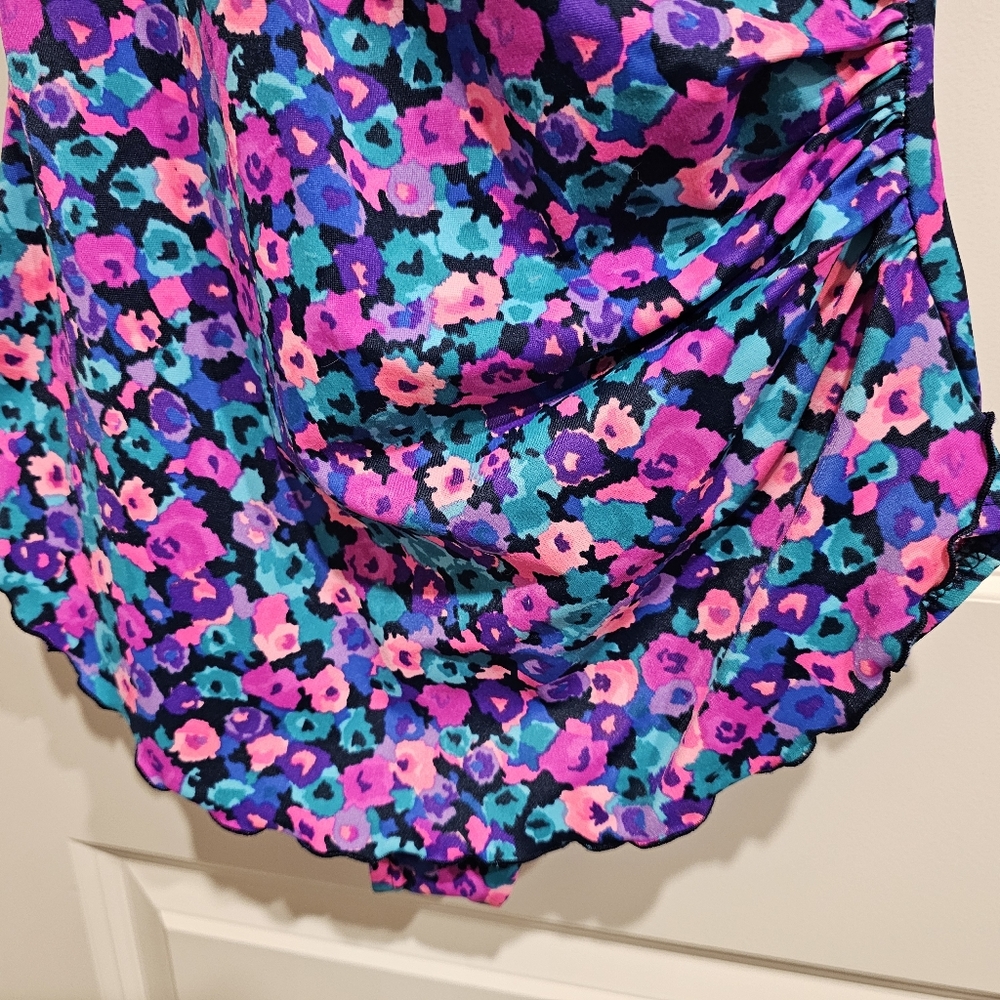 One piece tummy control, side ruched design, ruffled skirt